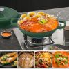 The enamel cast iron/Dutch oven soup pot features a circular shower-style lid design